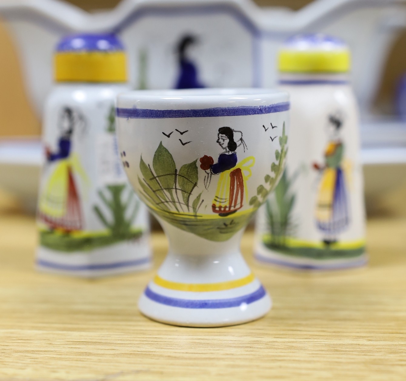 A collection of French Quimper tablewares